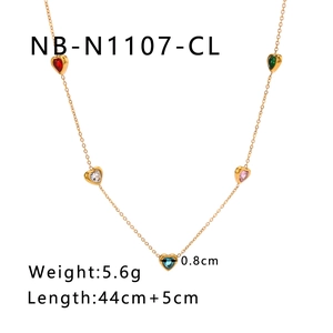 Detail of gold chain necklace featuring five multi-color heart-shaped zircon stones