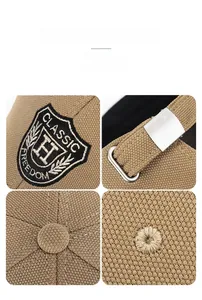 Detail view of khaki baseball cap featuring fine shield embroidery and metal buckle closure