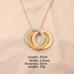 Macro view of interlocking tri-color ring necklace with detailed sizing specifications