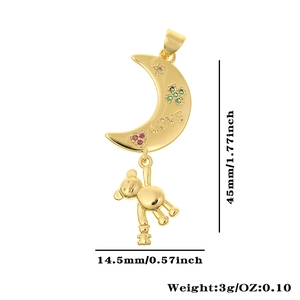 Detail of gold moon bear pendant with LOVE engraving and colorful zircon stones