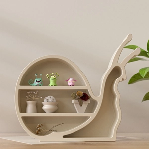 Detail of snail-shaped cream resin shelf with tiered compartments for small miniatures