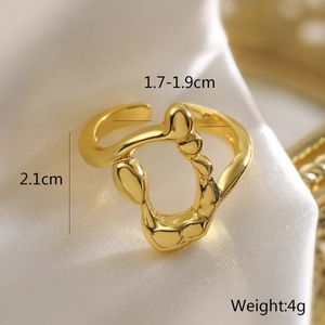 Detail view of irregular gold ring dimensions with 2.1cm width and 4g weight