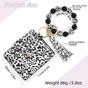 Detailed dimensions of leopard pattern wallet with silicone bead bracelet and tassels