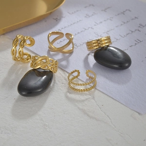 Collection of retro 14K gold-plated titanium steel rings with twisted and chain link designs