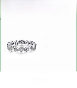 Macro detail of S925 sterling silver heart ring with sparkling crystals and 0.37cm width