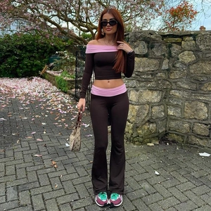 Brown and pink off-shoulder long sleeve top with slim fit flared trousers set