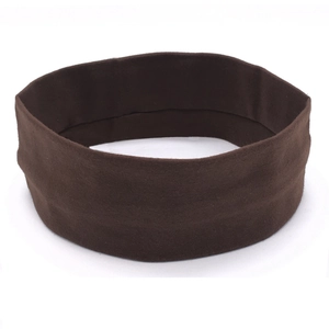 Detail shot of a coffee brown wide elastic yoga headband in a seamless loop design