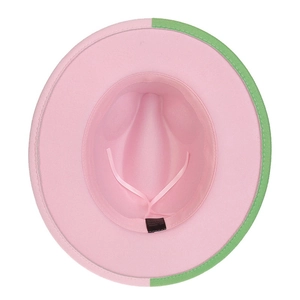 Macro detail of wool fedora hat interior with pink lining and adjustable sizing drawstring