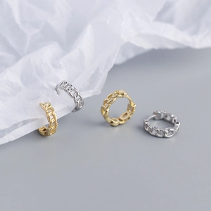 Detailed view of S925 sterling silver chain link earrings in gold and silver finish