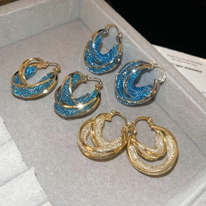Vintage layered mesh crystal hoop earrings with interlocking gold rings and blue accents