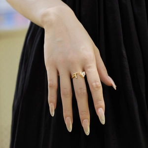 Detailed view of an adjustable gold S925 silver ring with a zircon heart and letter J