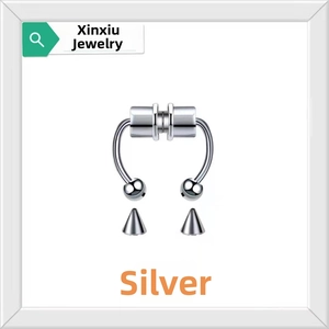Detail of silver magnetic horseshoe nose ring with interchangeable ball and spike studs