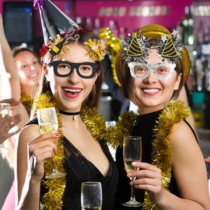 2026 New Year party glasses featuring black gold frames with stars and champagne decor