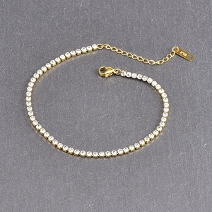 Elegant gold titanium steel anklet featuring cubic zirconia and an adjustable K18 tail chain
