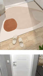 Detailed top view of beige and brown abstract patterned mat on wooden floor textures
