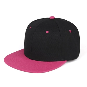 Close-up of black and pink snapback baseball cap with cotton twill texture