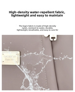 Close-up of waterproof high-density nylon fabric with water droplets on a brown crossbody bag