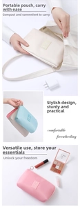 Macro shot of a pastel travel cable organizer with zipper closure and plane logo