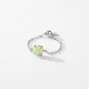 Minimalist S925 sterling silver chain ring featuring a round opal and adjustable bead