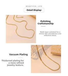 Detail showing polished gold snake bone chain with thick vacuum plating texture