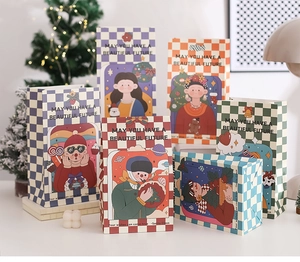 Close-up of festive Christmas paper gift bags with retro checkers and cartoon characters