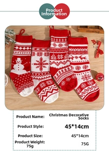 Detail view of 45x14cm knitted Christmas stockings with festive patterns on wood