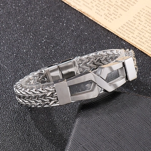 Detailed macro view of silver titanium steel chain bracelet with geometric clasp design