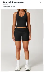 Detail of premium black yoga set featuring a V-neck vest and high-waist drawstring shorts