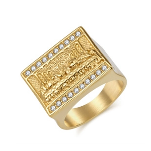 Detailed view of a gold signet ring with Last Supper relief and clear gemstone border