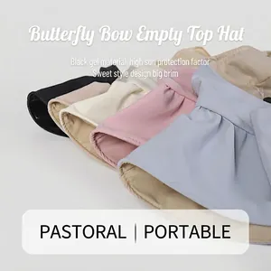 Visiera parasole donna anti-UV con tesa larga e fiocco in vari colori estivi