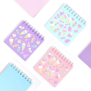 Mini spiral notebooks with pastel macaron covers and cartoon ice cream patterns