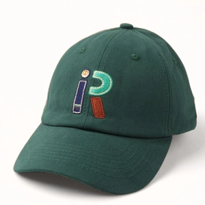 Close-up of dark green cotton baseball cap featuring retro letter R embroidery detail