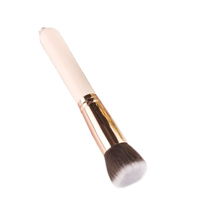 Flat top foundation brush with pink handle and rose gold metal ferrule for smooth makeup