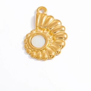 Detailed view of 18k gold plated shell pendant with central white pearl inlay