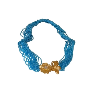 Multi-strand blue seed bead necklace with gold butterfly and diamond flower pendant