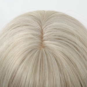 Detailed view of the realistic scalp parting and blonde hair texture on long wavy wig