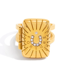 Detail of 18K gold stainless steel fortune ring with horseshoe and hinged locket