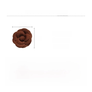 Detailed view of handmade camellia flannel flower brooch in coffee brown finish