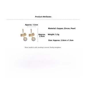 Détails des boucles d'oreilles perles et nœud avec dimensions 2,8x1,3 cm et un poids de 5,3 g