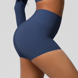 Detailed back view of high-waisted dark blue yoga shorts showing seamless shaping and lift