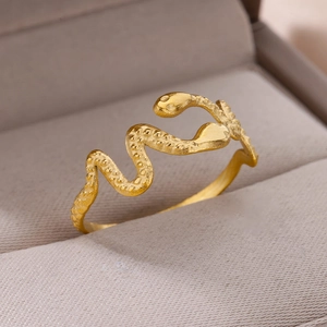 Macro shot of 18k gold plated stainless steel snake ring with textured scale details