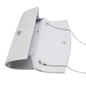 Detail of silver satin clutch interior showing magnetic closure and detachable chain