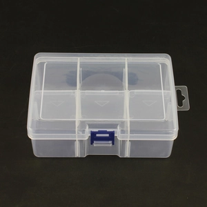 Top view of transparent 6-compartment plastic jewelry box with blue latch and hanging hole