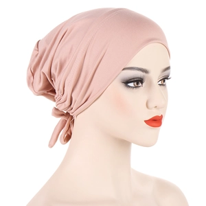 Detail of dusty pink satin-lined hijab undercap with adjustable back tie straps