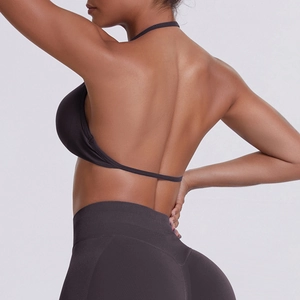 Detail of the back design on this chocolate brown halter sports bra and high waist yoga leggings
