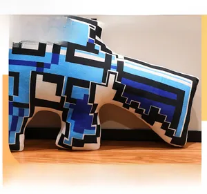 Detail of pixel art blue rifle plush pillow showing high-quality fabric and filling