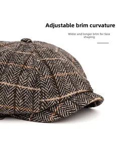 Detail of herringbone newsboy cap featuring a flexible foldable brim and wide design