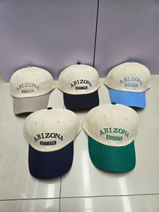 Detailed array of multi-color Arizona embroidered cotton baseball caps in various shades