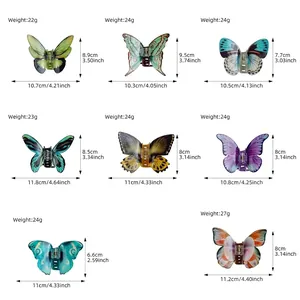 Size guide for elegant butterfly hair claws in various patterns and colors with measurements