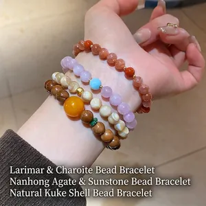 Handmade layered natural stone beaded bracelet with shell and kuka wood accents for women